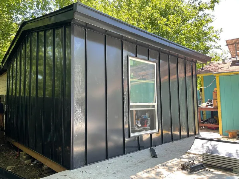 Black standing seam metal wall panels for Metal Roof Installation in North Royalton