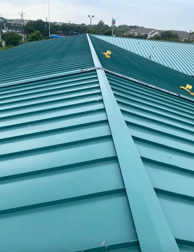 Green commercial metal roof ridge and valley for Metal Roof Repair in North Royalton